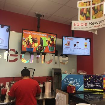 Edible Arrangements - a man at the counter of a restaurant - Gift Shops Near Me - Silver Spring, Maryland Edible Arrangements - a man at the counter of a restaurant - Gift Shops Near Me - Silver Spring, Maryland