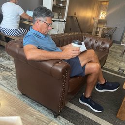 Hubby relaxing after a big breakfast panini Hubby relaxing after a big breakfast panini