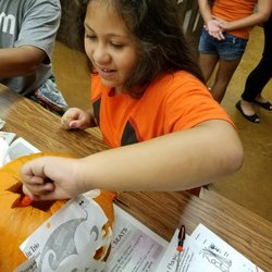 Kipapa Elementary School - Cleaning out the pumpkin.