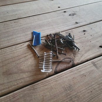 Beach Realty & Construction & Kitty Hawk Rentals - rusty nail and screws found on the open deck and in the sand around the property - General Contractors Near Me - Kitty Hawk, North Carolina