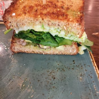 First Watch - A closer up photo of the inside of the veggie sandwich - Breakfast & Brunch Near Me - Schaumburg, Illinois