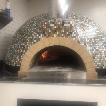MOZZ Artisan Pizza - 22,222 tiles were used in the construction of the pizza oven. - Pizza Near Me - Provo, Utah MOZZ Artisan Pizza - 22,222 tiles were used in the construction of the pizza oven. - Pizza Near Me - Provo, Utah