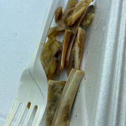 Golden Krust - This was just 1/3 of the bones!!! And look at the hair smh I'm pissed