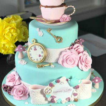 Rominas Cake - a cake with a clock and roses - Custom Cakes Near Me Rominas Cake - a cake with a clock and roses - Custom Cakes Near Me