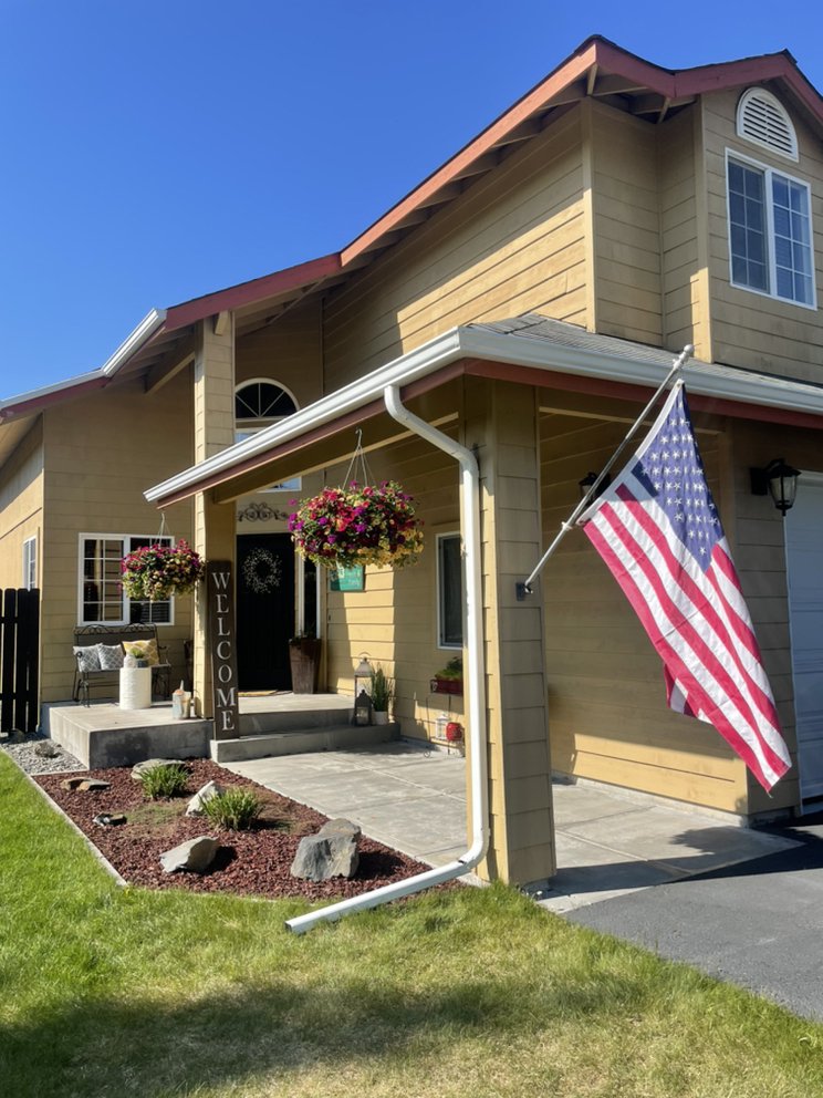 Slide of K-Bay Roofing