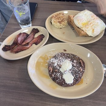 Snooze, an A.M. Eatery - Turtle Pancake, Breakfast Pot pie, bacon - Breakfast & Brunch Near Me - Nashville, Tennessee