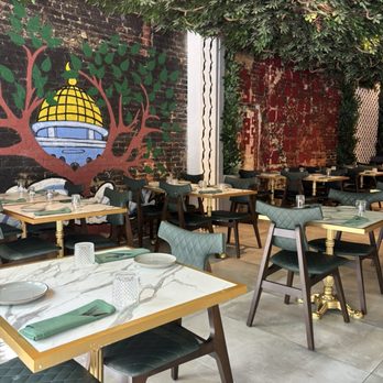 Al Badawi - A Quick Look at the front area. Beautifully decorated with 3D foliage and vivid wall paintings. - Middle Eastern Near Me - Somerville, New Jersey