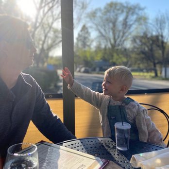 Alchemy - Enjoying our time with a beautiful background sunset. Felt very covid safe on patio. - New American Near Me - Murphys, California