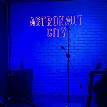 Astronaut City - The stage with their iconic neon sign - Comedy Clubs Near Me - Arcadia, California
