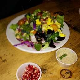 Amazing salad bar with fresh wild greens, watercress, avocado, hazelnuts, persimmon, farm fresh eggs, homemade dressing, etc Amazing salad bar with fresh wild greens, watercress, avocado, hazelnuts, persimmon, farm fresh eggs, homemade dressing, etc