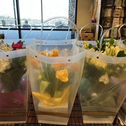 Whole Foods Market - Spring flowers in bags that resemble baskets.