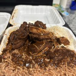 They packed it to the max! Stew chicken with rice and peas and extra gravy please!
