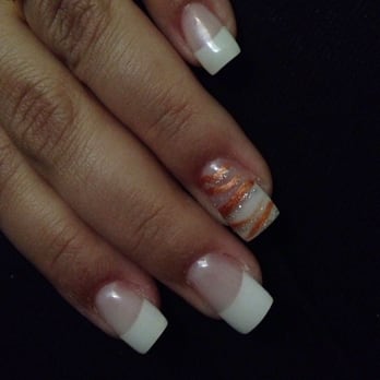 A List Nail Bar - Awrunee did such a great job on my French tip fill, square shape and cute zebra print! I am wishing for fall with the burnt orange color. - Nail Salons Near Me - Stockton, California