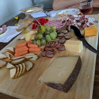 Bare Bones Butcher - Capicola, andouille, keilbasa, and bologna. Some veggies, fruit, and cheese. A nice rose with bubbles. - Grocery Near Me - Nashville, Tennessee