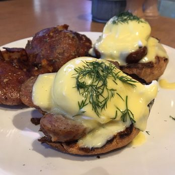 Lola - Eggs Benedict with Garlic Smashed Potatoes - Greek Near Me - Seattle, Washington Lola - Eggs Benedict with Garlic Smashed Potatoes - Greek Near Me - Seattle, Washington