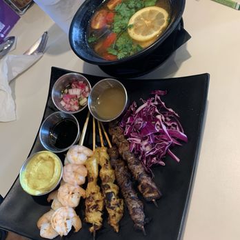 Lulu's Thai Noodle Shop - Tom Yum Soup comes with the Low-Carb Satay Plate - Thai Near Me - Overland Park, Kansas