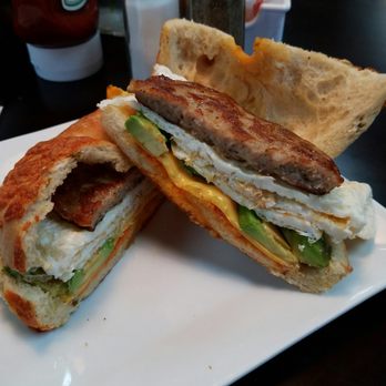 Isaac's Bagel Cafe - Cheddar jalapeño bagel scooped out toasted with avocado, egg whites sausage and cheese - Breakfast & Brunch Near Me - Bloomfield, Connecticut
