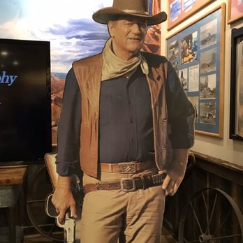 Red Cliffs Lodge Moab - John Wayne hanging out in the museum - Hotels Near Me - Moab, Utah