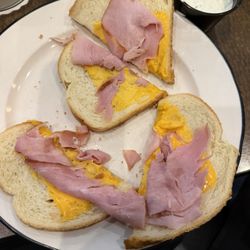 Sterling's Restaurant - Opened my $16 grilled ham and cheese wow. A little scrap of ham and a slice of processed cheese. We miss you Jim.