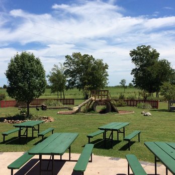 Good Luck Grill - Great spot for families! Small covered back porch with seating, and plenty of space for the kiddos to run around. - American Near Me - Manor, Texas