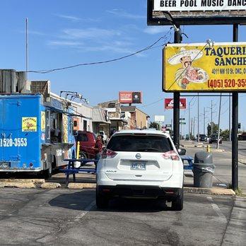 Taqueria Sanchez - a car parked in front of a food truck - Mexican Near Me - Oklahoma City, Oklahoma Taqueria Sanchez - a car parked in front of a food truck - Mexican Near Me - Oklahoma City, Oklahoma