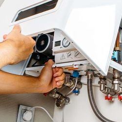 Bison Plumbing Solutions - Tankless Hot Water heater repair