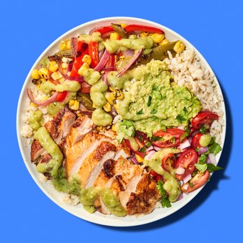 Just Salad - a plate of chicken, rice, and vegetables - Salad Near Me - Doral, Florida Just Salad - a plate of chicken, rice, and vegetables - Salad Near Me - Doral, Florida