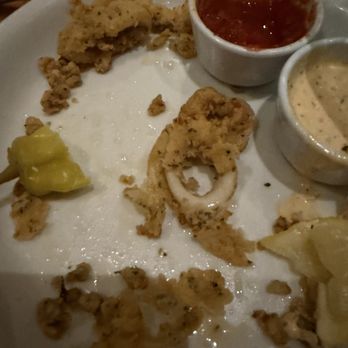 Olive Garden Italian Restaurant - Calamari showing the pieces that kept falling off - Italian Near Me - Orlando, Florida Olive Garden Italian Restaurant - Calamari showing the pieces that kept falling off - Italian Near Me - Orlando, Florida