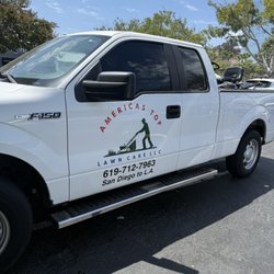 Americas Top Lawn Care - Company vehicle and riding lawn mower