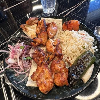 Konak Turkish Cuisine - Chicken shish - chicken breast meat is from frozen chicken breast, the meat is sort of spongy but still flavourful , rice is very bland. - Turkish Near Me - Toronto, Ontario Konak Turkish Cuisine - Chicken shish - chicken breast meat is from frozen chicken breast, the meat is sort of spongy but still flavourful , rice is very bland. - Turkish Near Me - Toronto, Ontario