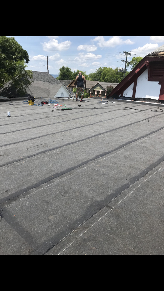 Slide of Advanced Roofing & Paving