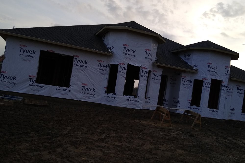 Slide of Lopez Construction and Framing