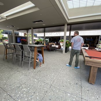 Olive Grove Cafe - Outdoor seating and pool table. - Coffee & Tea Near Me - Irvine, California Olive Grove Cafe - Outdoor seating and pool table. - Coffee & Tea Near Me - Irvine, California
