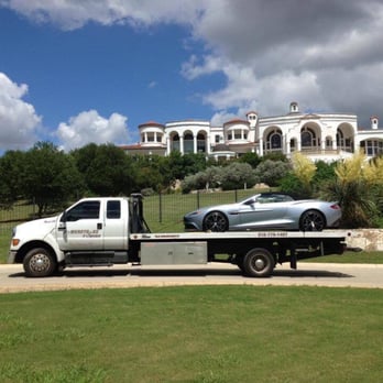 Powerstroke Towing - 2014 Aston Martin vanquish, repeat customer...being towed just for delivery purposes. - Towing Near Me - San Antonio, Texas Powerstroke Towing - 2014 Aston Martin vanquish, repeat customer...being towed just for delivery purposes. - Towing Near Me - San Antonio, Texas