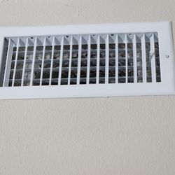 Next Level Heating and Cooling - After: All 8 AC register grills changed to bar type ones.