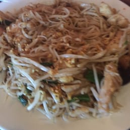 Pad Thai, chicken spring rolls and green curry Pad Thai, chicken spring rolls and green curry