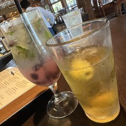Blueberry Mojito and a beer with olives and some olive jice
