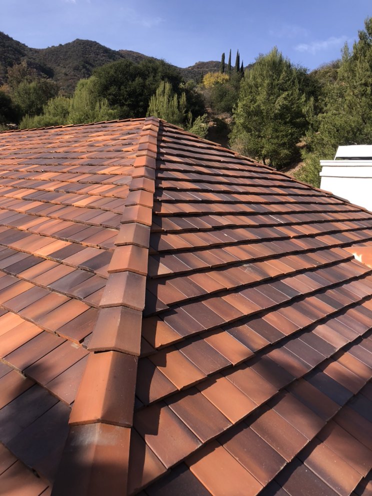 Slide of GEM Roofing