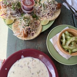 Clam chowder, fish tacos, and cucumber salad Clam chowder, fish tacos, and cucumber salad
