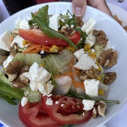 Persepolis - Persepolis Salat  with tomatoes, cucumbers, peppers, feta cheese, walnuts, olives and a special homemade dressing