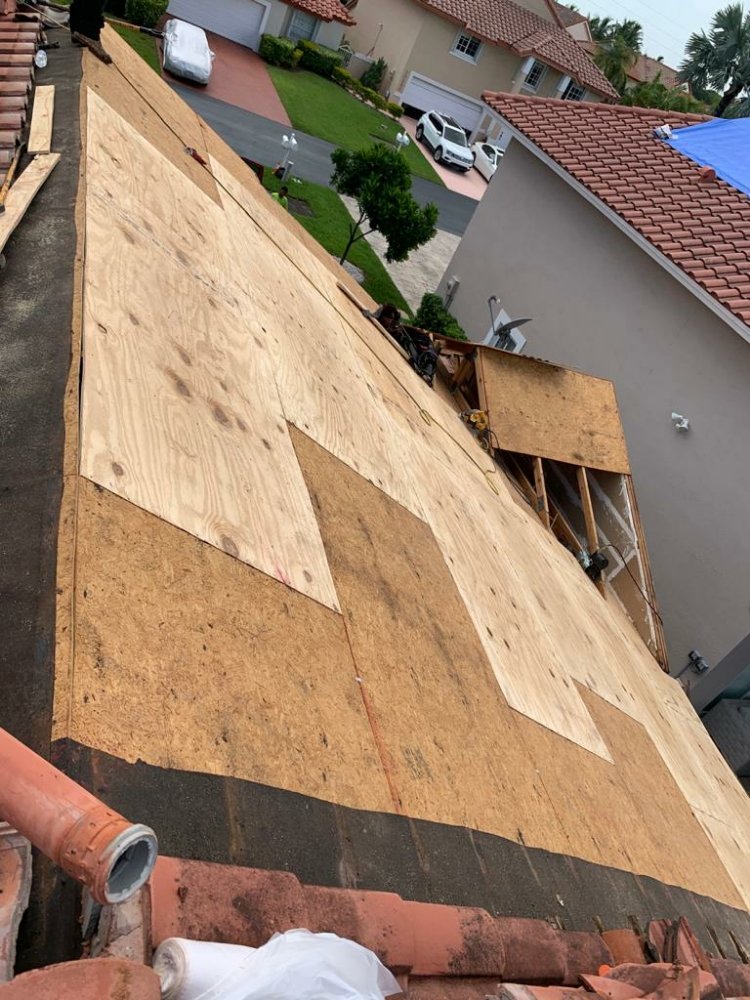 Slide of UnderCover Roofing & Metal