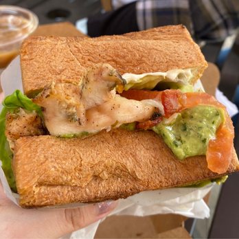 Eggspresso - Chicken sandwich. SO GOOD. Spanish oat milk latte in the background. - Breakfast & Brunch Near Me - Fullerton, California
