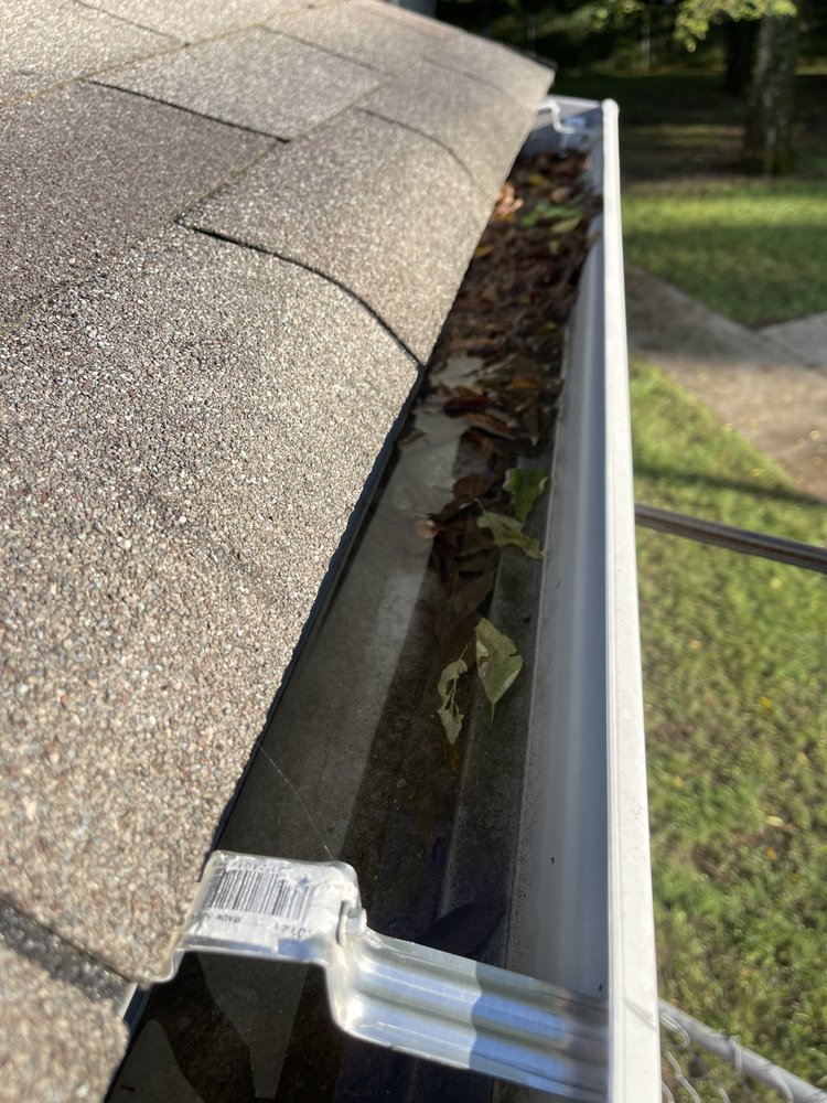 Slide of Marcus Gutters Cleaning