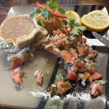 Alfonso's Authentic Mexican Food - Grilled salmon with pico de gallo and a side of rice topped with a slice of bell pepper and beans in a tortilla bowl - Mexican Near Me - Castroville, California