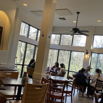 New Orleans Food & Spirits - people eating in a restaurant - Seafood Near Me - Covington, Louisiana