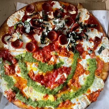Rubirosa - GF pizza pie: half supreme & half tie-dye ($27) - Italian Near Me - New York, New York