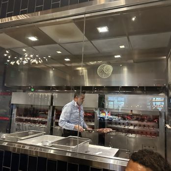 Fogo de Chão - Food being prepared. - Brazilian Near Me - Atlanta, Georgia Fogo de Chão - Food being prepared. - Brazilian Near Me - Atlanta, Georgia