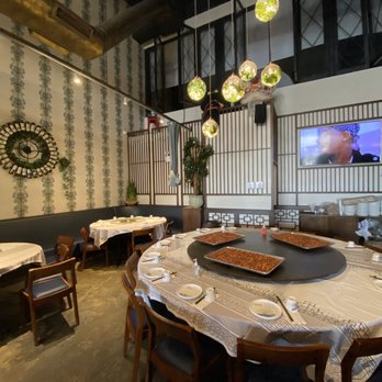 BK Seafood Market - a dining room with a large table and chairs - Cantonese Near Me - Brooklyn, New York