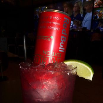 Tom's Watch Bar - We had some cocktails to get our game buzz going. The Party Starter was made with a double dose of Tom's 'Rita with hibiscus & red bull. - Sports Bars Near Me - Denver, Colorado Tom's Watch Bar - We had some cocktails to get our game buzz going. The Party Starter was made with a double dose of Tom's 'Rita with hibiscus & red bull. - Sports Bars Near Me - Denver, Colorado
