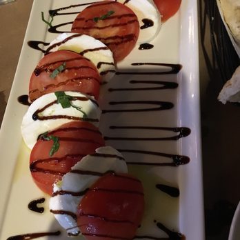 Terra & Acqua - Gave us part of the tomato with the stem and hardly any basil. - Italian Near Me - St. Augustine, Florida Terra & Acqua - Gave us part of the tomato with the stem and hardly any basil. - Italian Near Me - St. Augustine, Florida